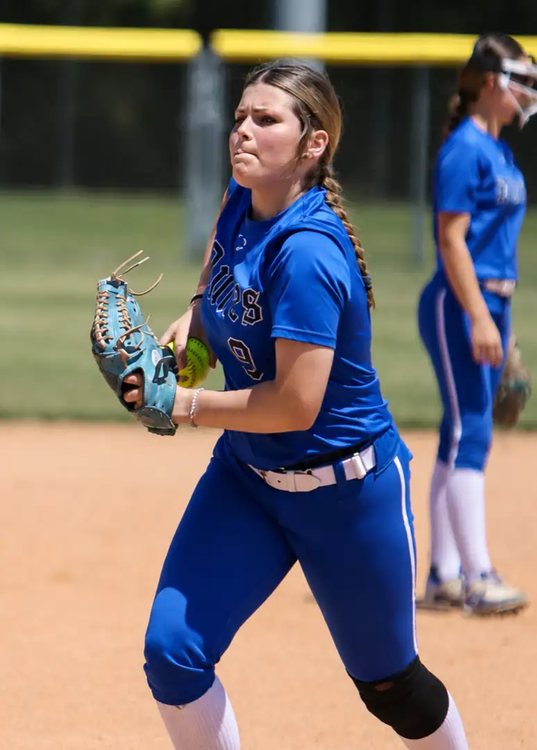 Addyson Sanchez in pitching motion, blue uniform.